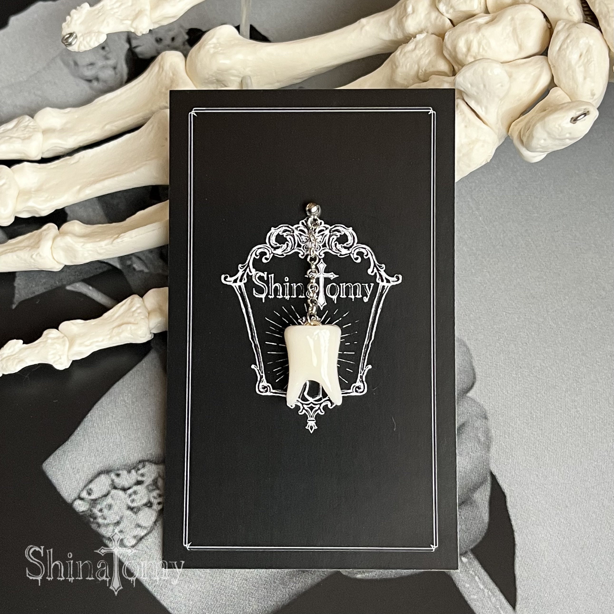 Tooth piercing (one ear only)