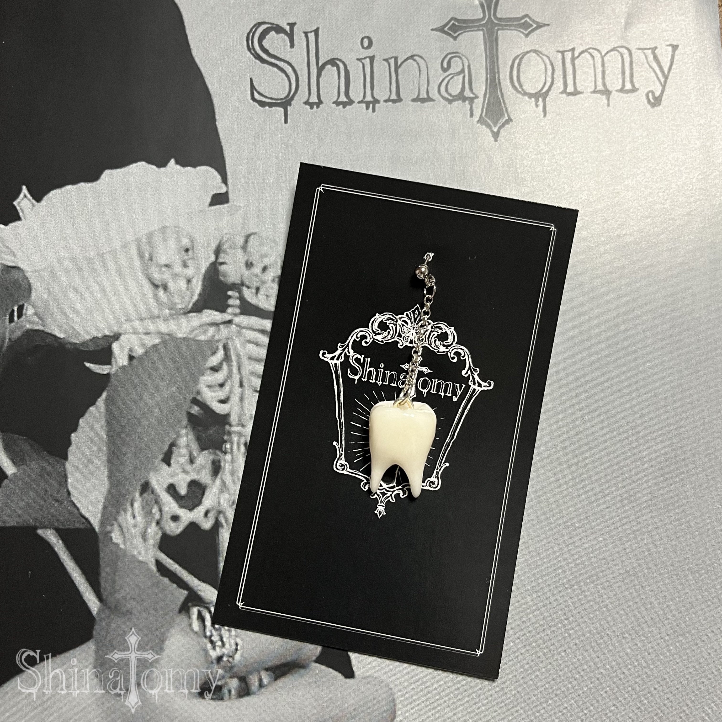 Tooth piercing (one ear only)