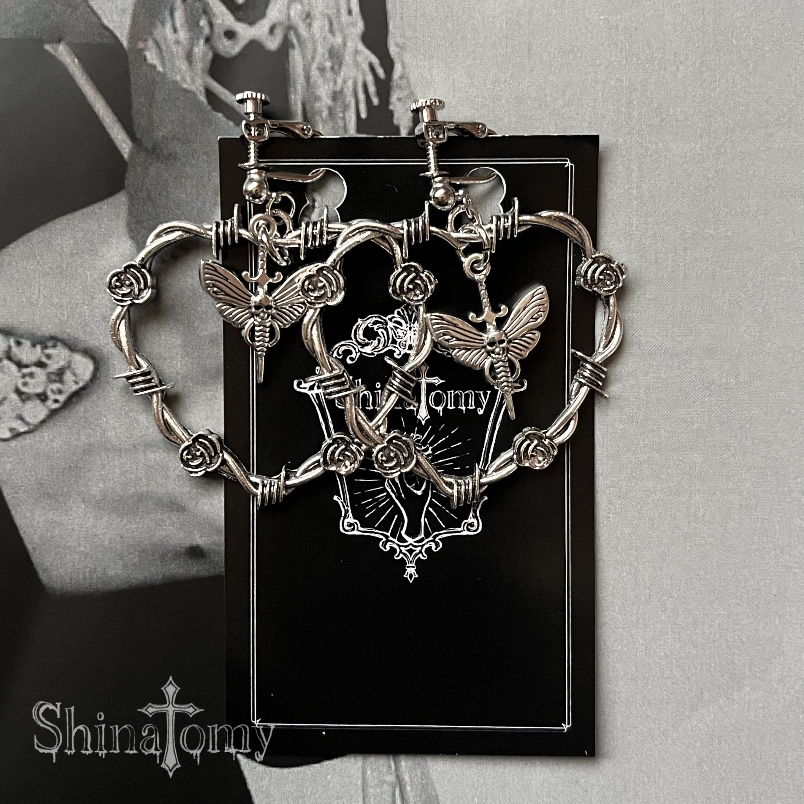 Dangling skull butterfly earrings