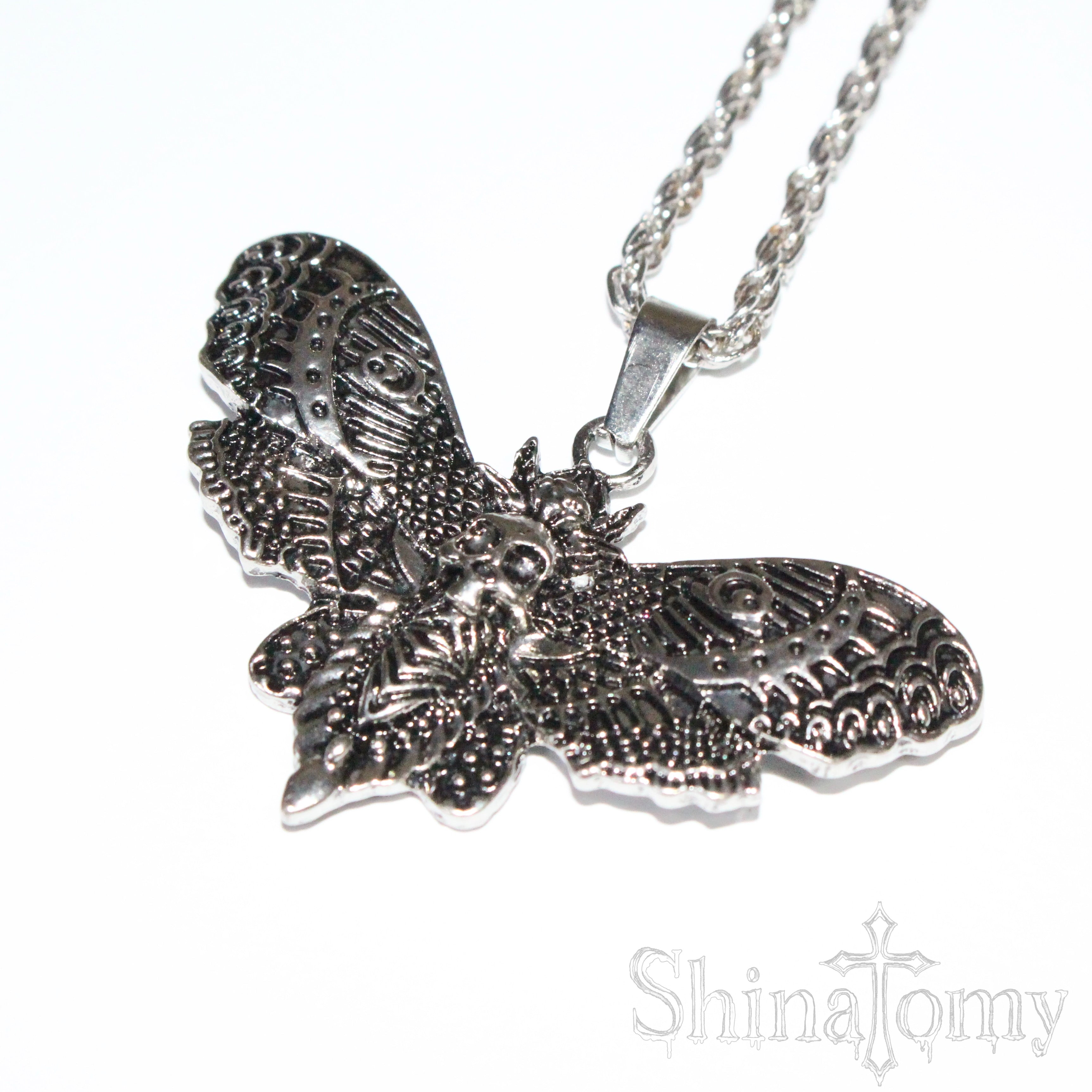 butterfly skull necklace