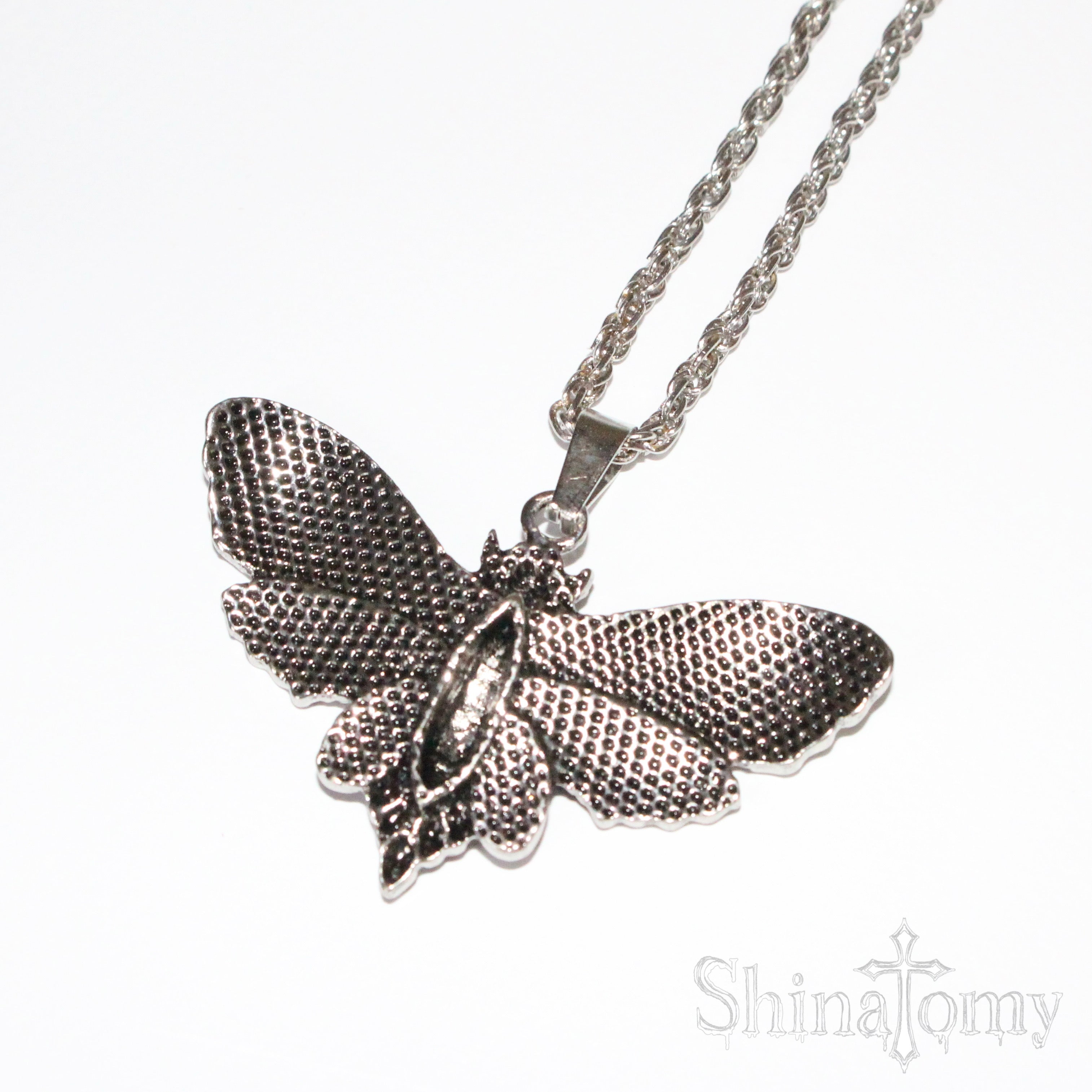 butterfly skull necklace