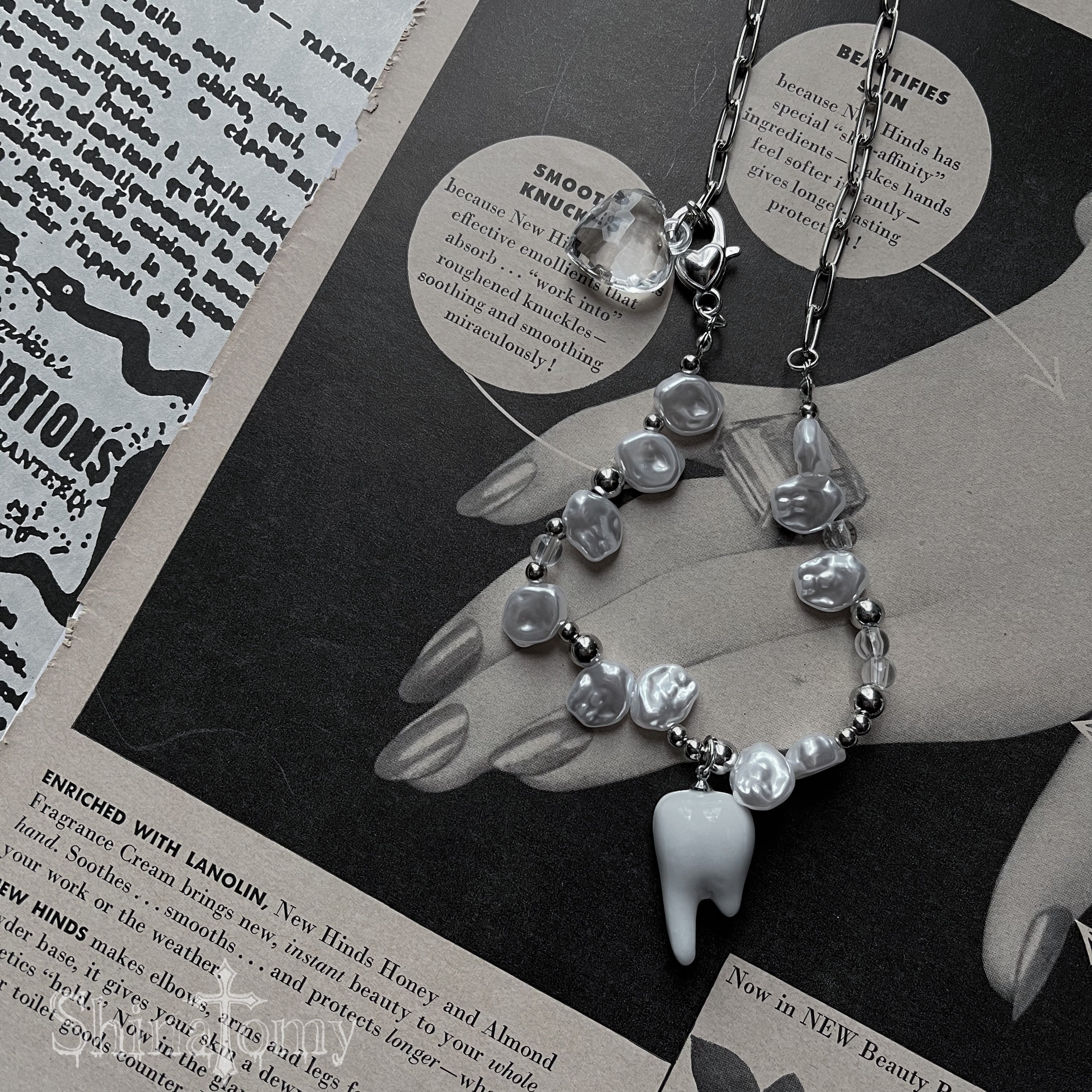 necklace that walks with teeth