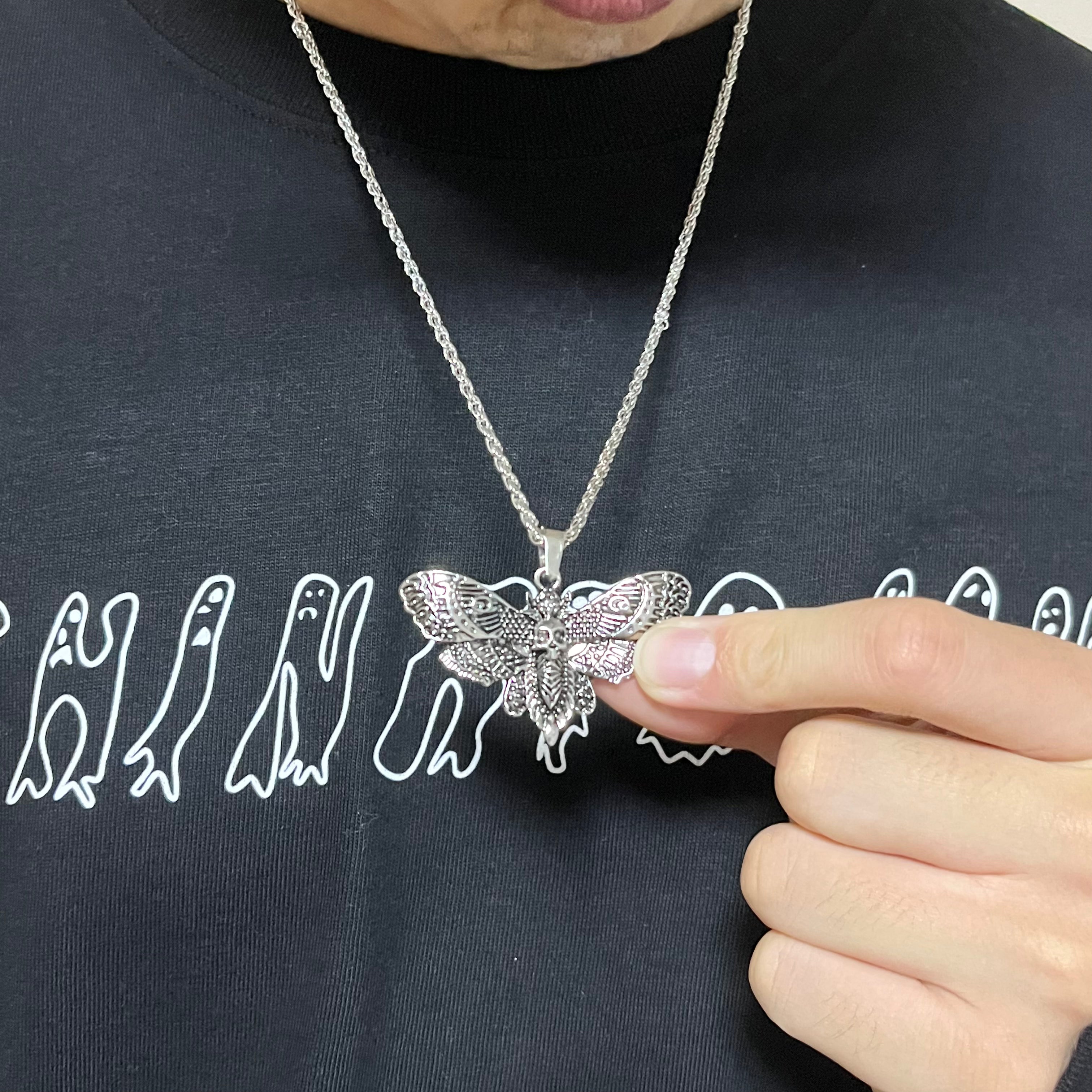 butterfly skull necklace